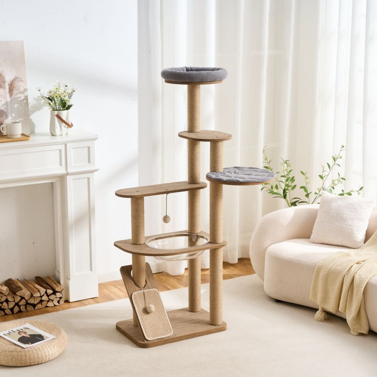 Large cat tree in a living room with a couch and fireplace