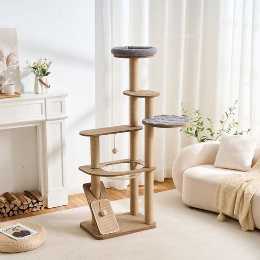 Large cat tree in a living room with a couch and fireplace