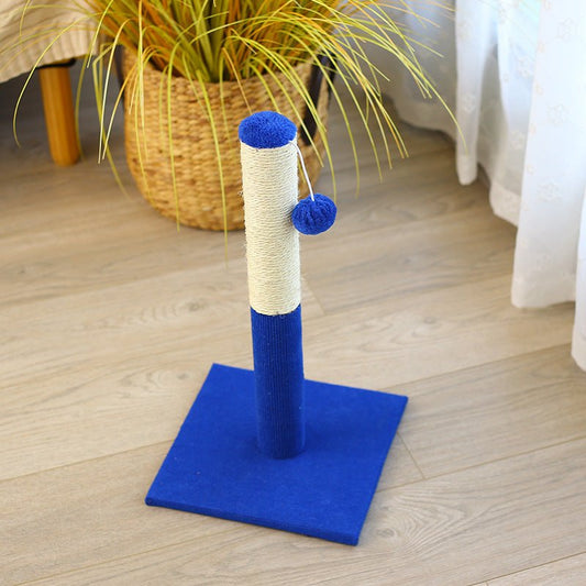 Blue cat scratch post with sisal-covered pole and blue balls on a wooden floor.