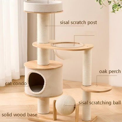 A multi-level cat tower tree with labeled callouts showing its parts: sisal scratch post, oak perch, cat condo, solid wood base, and sisal scratching ball, photographed in a softly lit indoor room.