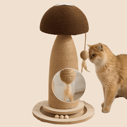 A cat post with a mushroom cap, sisal-wrapped body, and dangling toy balls, shown beside a fluffy orange cat on a plain beige background.