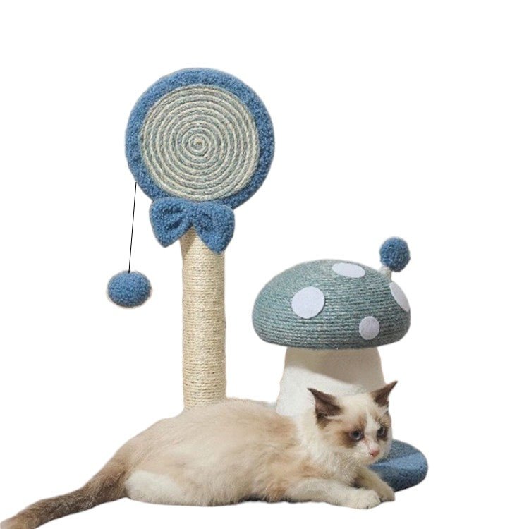 Cat playing with a blue and beige cat mushroom tree on a white background